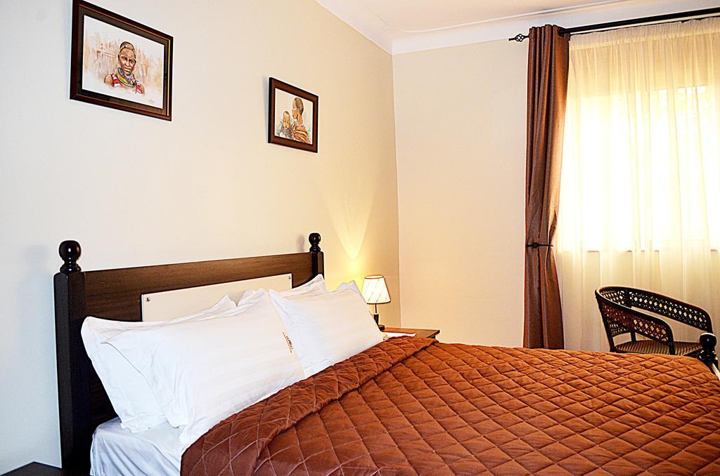 Marie'S Royale Hotel Kampala Habitación foto